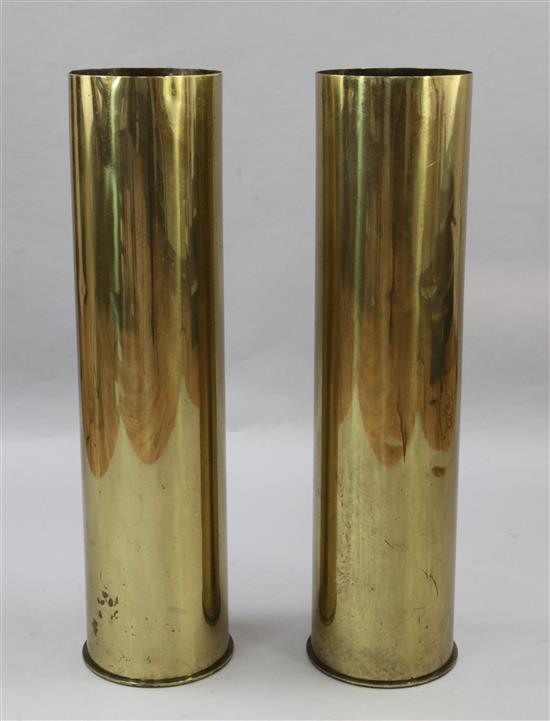 A pair of Karlsruhe Patronen Fabrik brass naval shell cases, H.40.5in.